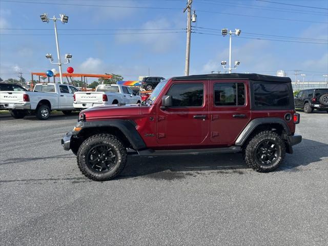 Photo of 2021 Snazzberry Pearlcoat Jeep Wrangler