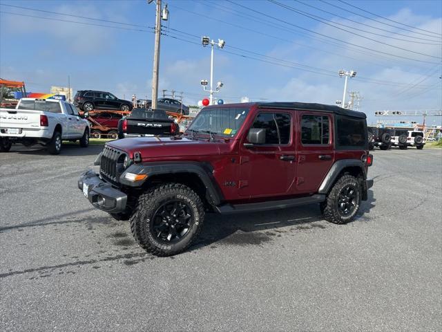 Photo of 2021 Snazzberry Pearlcoat Jeep Wrangler