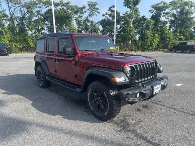 Photo of 2021 Snazzberry Pearlcoat Jeep Wrangler