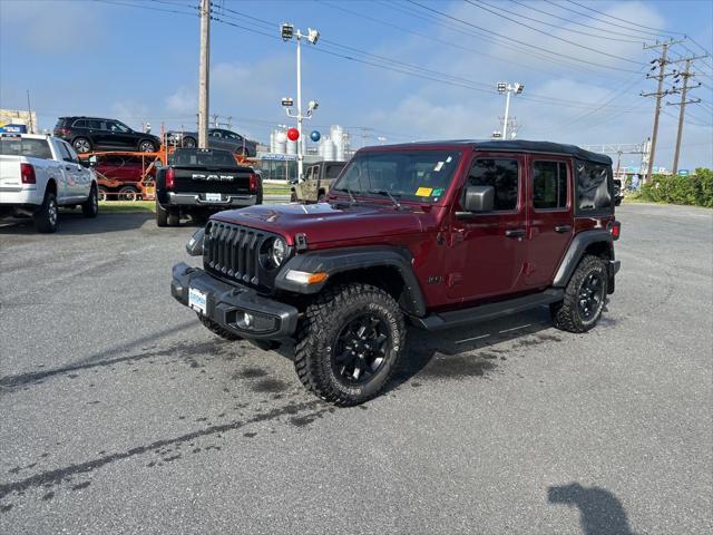 Photo of 2021 Snazzberry Pearlcoat Jeep Wrangler