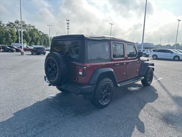 Photo of 2021 Snazzberry Pearlcoat Jeep Wrangler