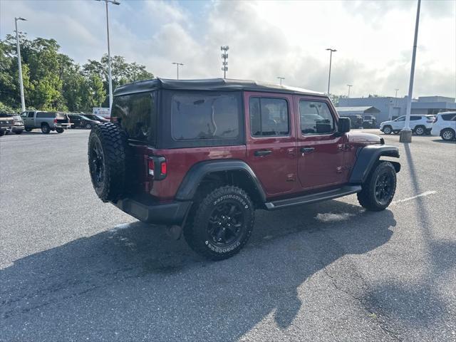 Photo of 2021 Snazzberry Pearlcoat Jeep Wrangler