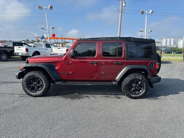 Photo of 2021 Snazzberry Pearlcoat Jeep Wrangler