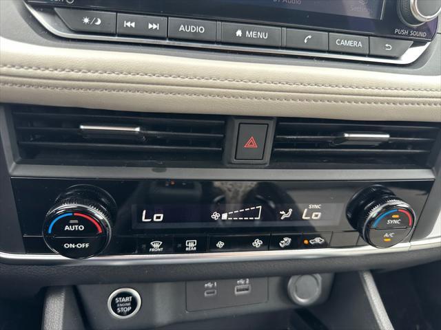 Photo of 2023 Pearl White Tricoat Nissan Rogue