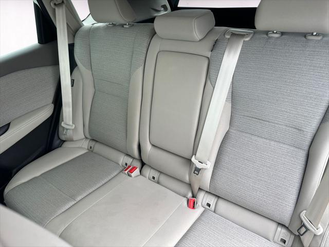 Photo of 2023 Pearl White Tricoat Nissan Rogue