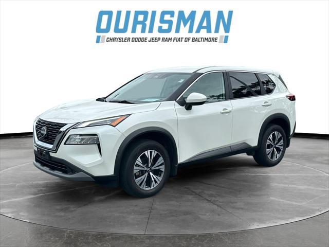 Photo of 2023 Pearl White Tricoat Nissan Rogue