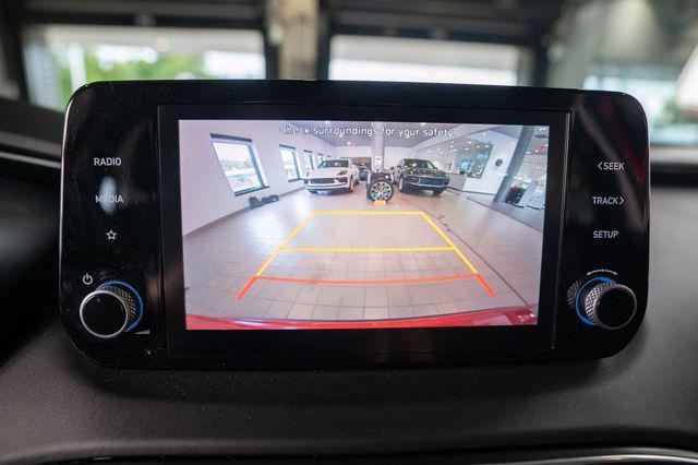 Photo of 2023 Calypso Red Hyundai SANTA FE