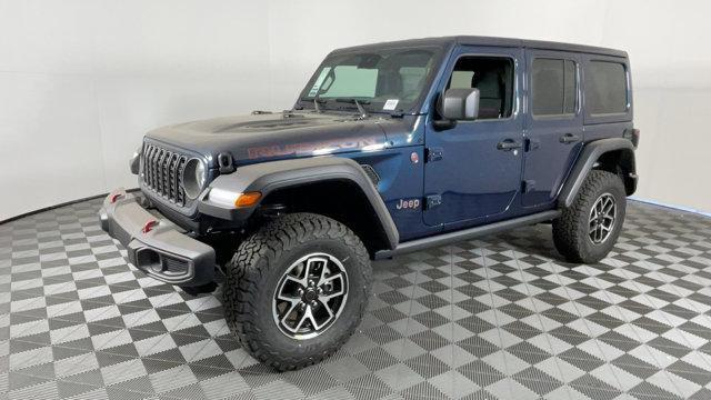 Photo of 2025 Fathom Blue Pearlcoat Jeep Wrangler