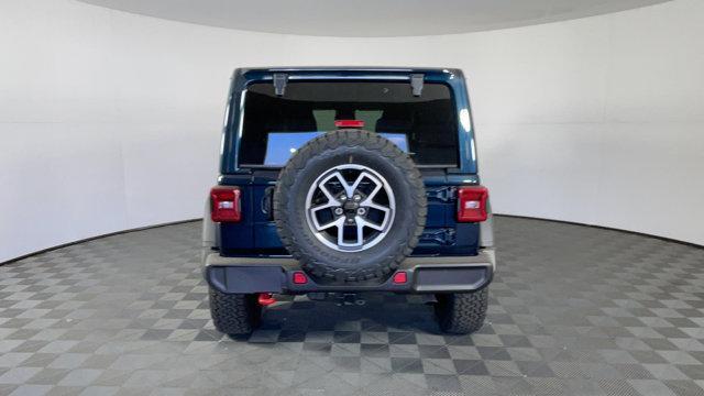 Photo of 2025 Fathom Blue Pearlcoat Jeep Wrangler