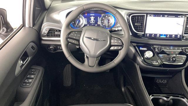 Photo of 2025 Bright White Clearcoat Chrysler Pacifica