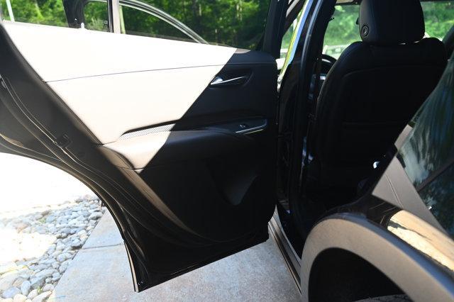Photo of 2021 Stellar Black Metallic Cadillac XT4