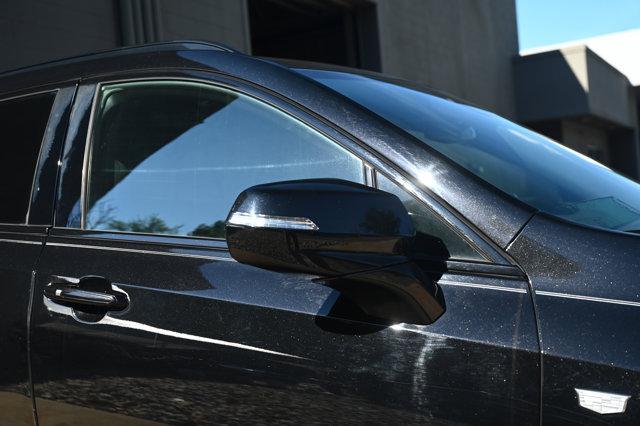Photo of 2021 Stellar Black Metallic Cadillac XT4