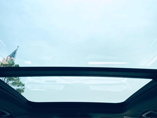 Photo of 2026 Cherry Red Tintcoat Buick Enclave