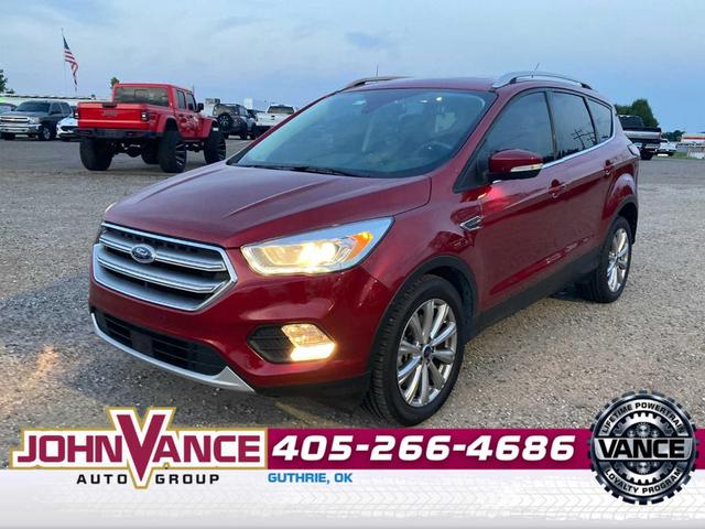 Photo of 2017 Ruby Red Metallic Tinted Clearcoat Ford Escape