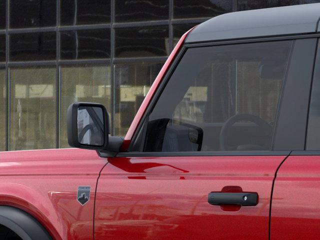 Photo of 2025 Ruby Red Metallic Tinted Clearcoat Ford Bronco