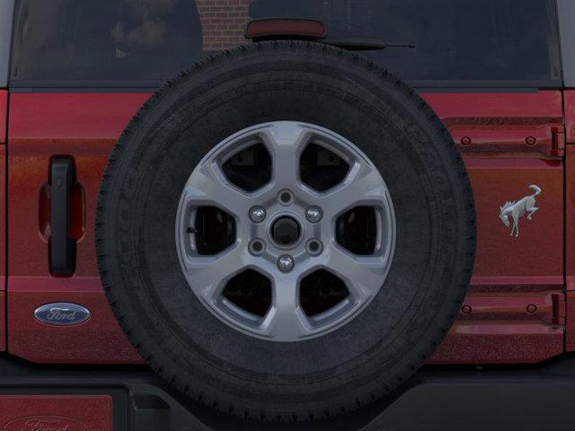 Photo of 2025 Ruby Red Metallic Tinted Clearcoat Ford Bronco