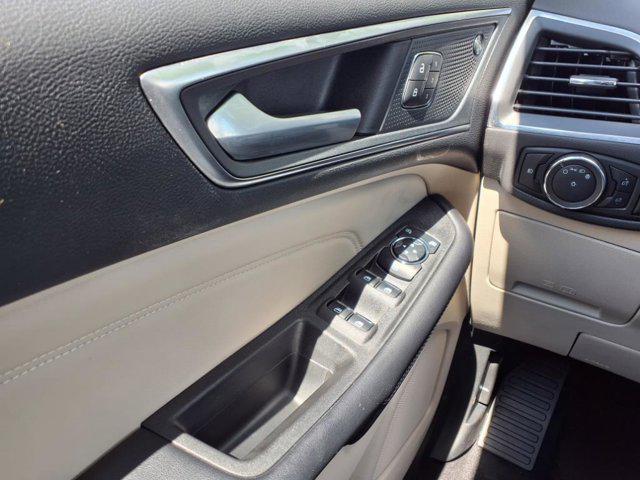 Photo of 2023 Burgundy Velvet Metallic Tinted Clearcoat Ford Edge