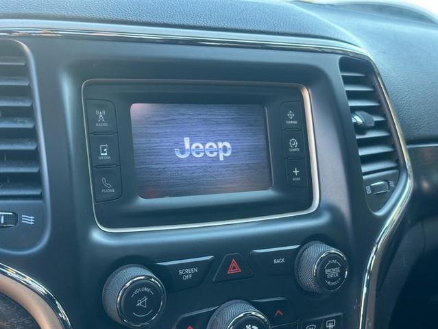 Photo of 2014 Bright White Clearcoat Jeep Grand Cherokee