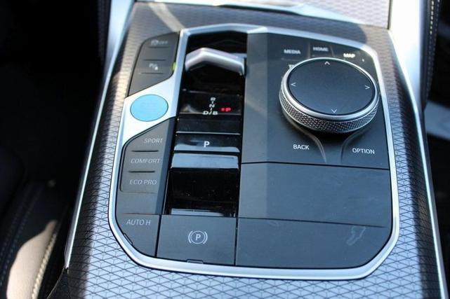 Photo of 2025 Black Sapphire Metallic BMW i4 Gran Coupe