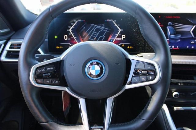Photo of 2025 Black Sapphire Metallic BMW i4 Gran Coupe