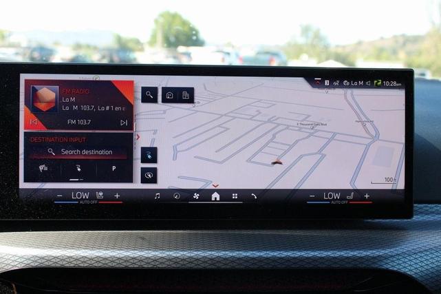 Photo of 2025 Black Sapphire Metallic BMW i4 Gran Coupe