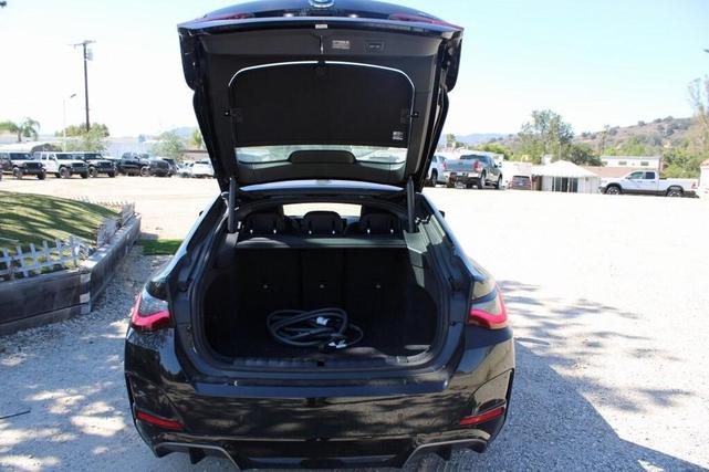 Photo of 2025 Black Sapphire Metallic BMW i4 Gran Coupe