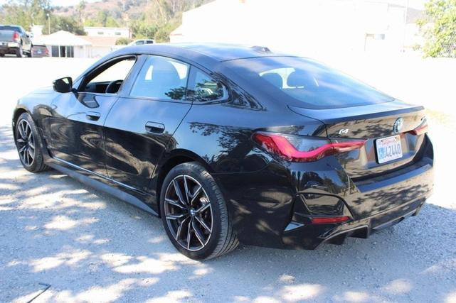 Photo of 2025 Black Sapphire Metallic BMW i4 Gran Coupe