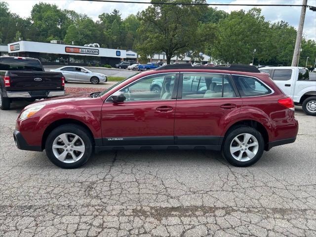 Photo of 2014 Burgundy Subaru Outback
