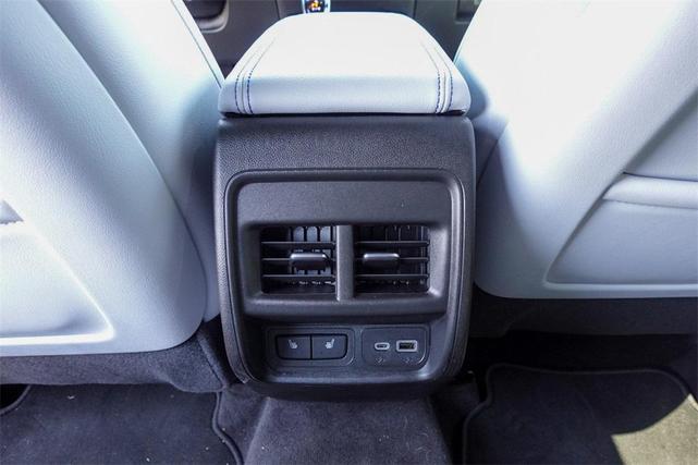 Photo of 2025 Crystal White Tricoat Cadillac XT4
