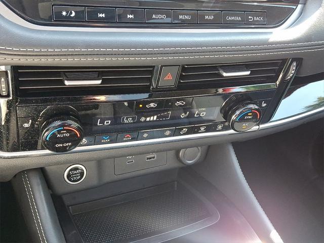 Photo of 2022 Scarlet Ember Tintcoat Nissan Rogue