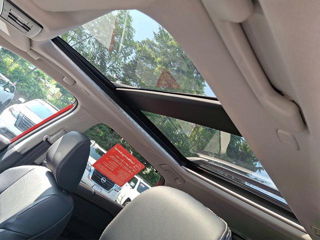 Photo of 2022 Scarlet Ember Tintcoat Nissan Rogue