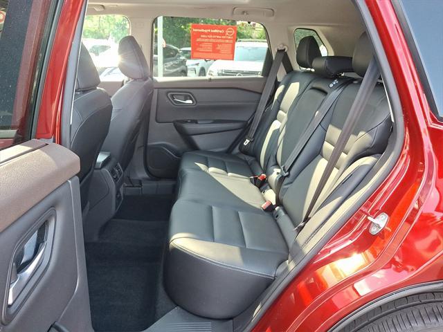 Photo of 2022 Scarlet Ember Tintcoat Nissan Rogue