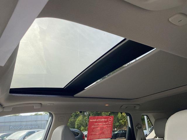 Photo of 2023 Pearl White Tricoat Nissan Rogue