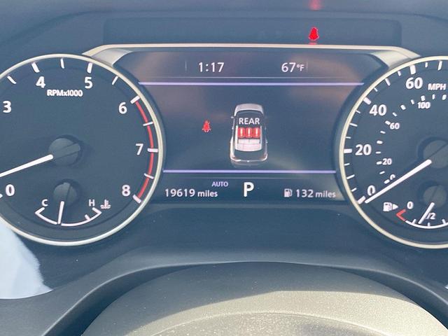 Photo of 2023 Pearl White Tricoat Nissan Rogue