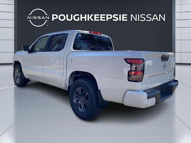 Photo of 2025 Glacier White Nissan Frontier