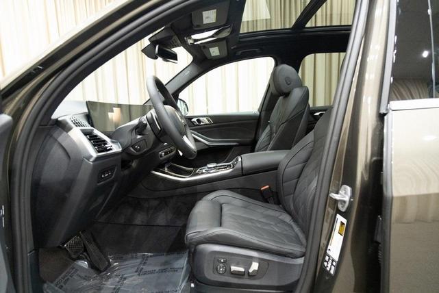 Photo of 2026 Green Metallic BMW X5
