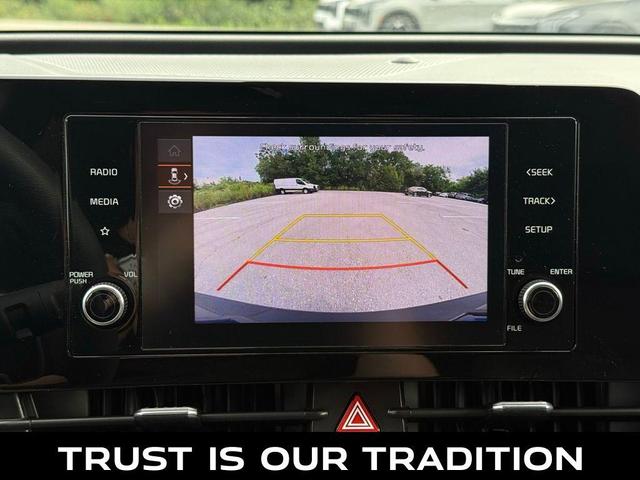 Photo of 2023 Snow White Pearl Kia Sportage Hybrid