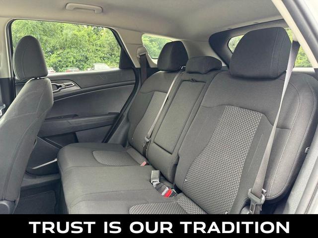 Photo of 2023 Snow White Pearl Kia Sportage Hybrid