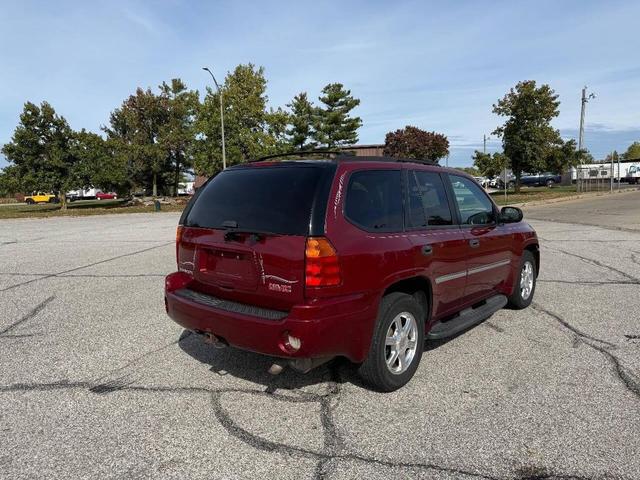 Photo of 2009 Dark Crimson Metallic GMC Envoy