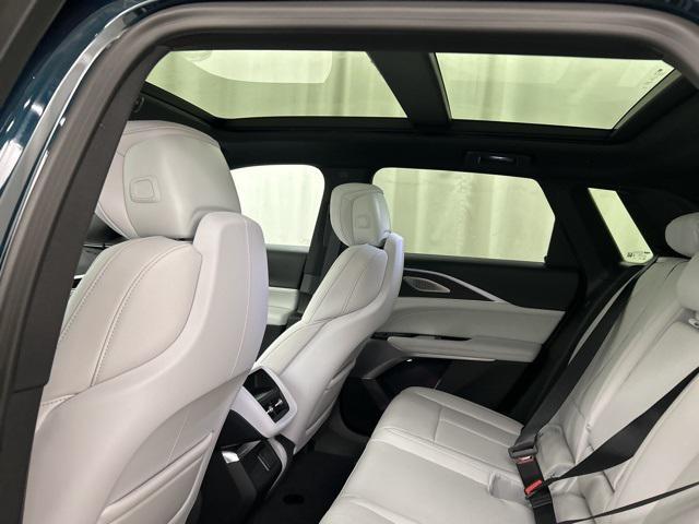 Photo of 2025 Emerald Lake Metallic Cadillac LYRIQ