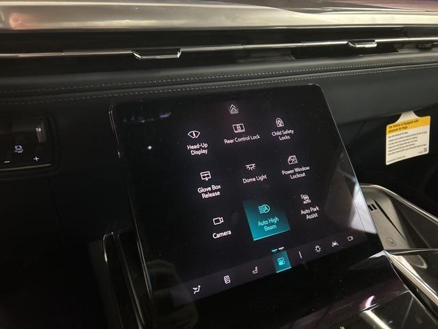 Photo of 2025 Black Raven Cadillac Escalade IQ