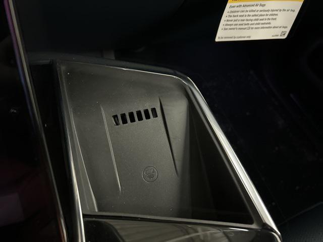Photo of 2025 Black Raven Cadillac Escalade IQ