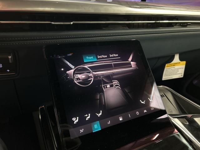 Photo of 2025 Black Raven Cadillac Escalade IQ