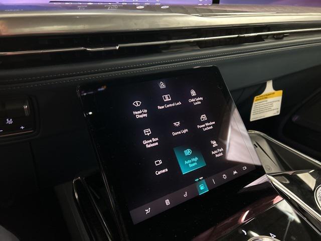 Photo of 2025 Black Raven Cadillac Escalade IQ