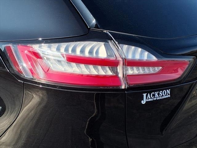 Photo of 2024 Agate Black Metallic Ford Edge
