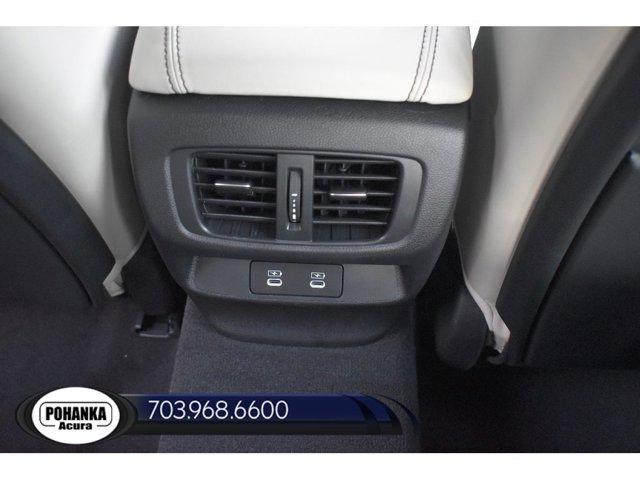 Photo of 2025 Apex Blue Pearl Acura TLX