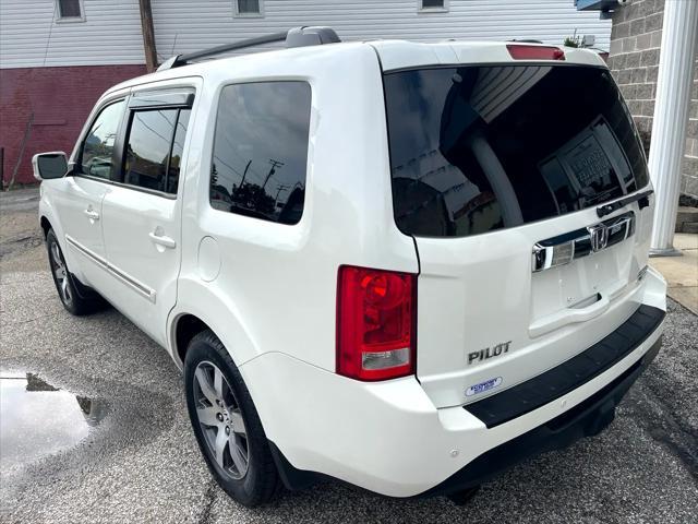 Photo of 2012 White Honda Pilot