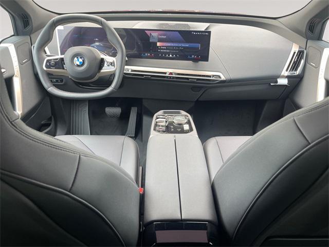 Photo of 2026 Aventurin Red Metallic BMW iX