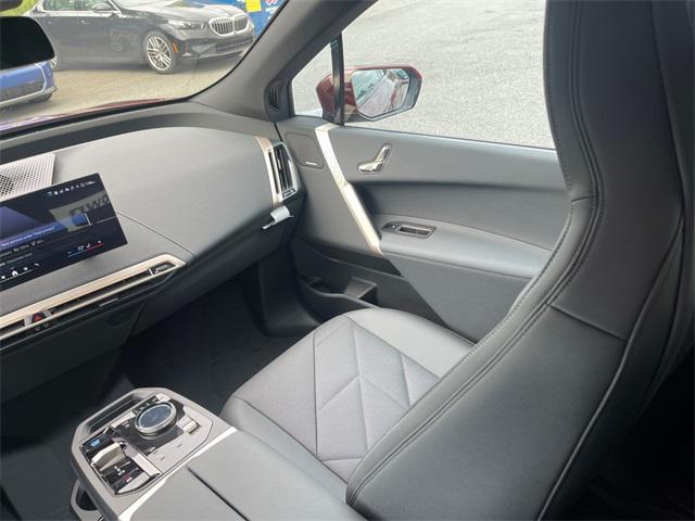 Photo of 2026 Aventurin Red Metallic BMW iX