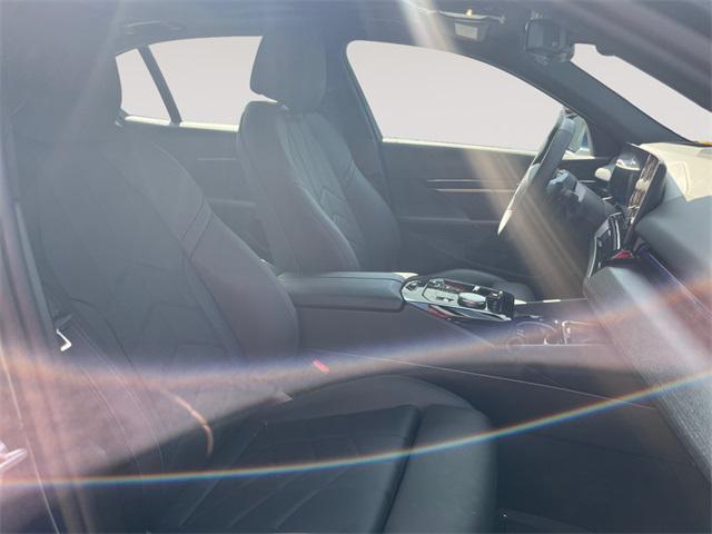 Photo of 2025 Blue Metallic BMW 530